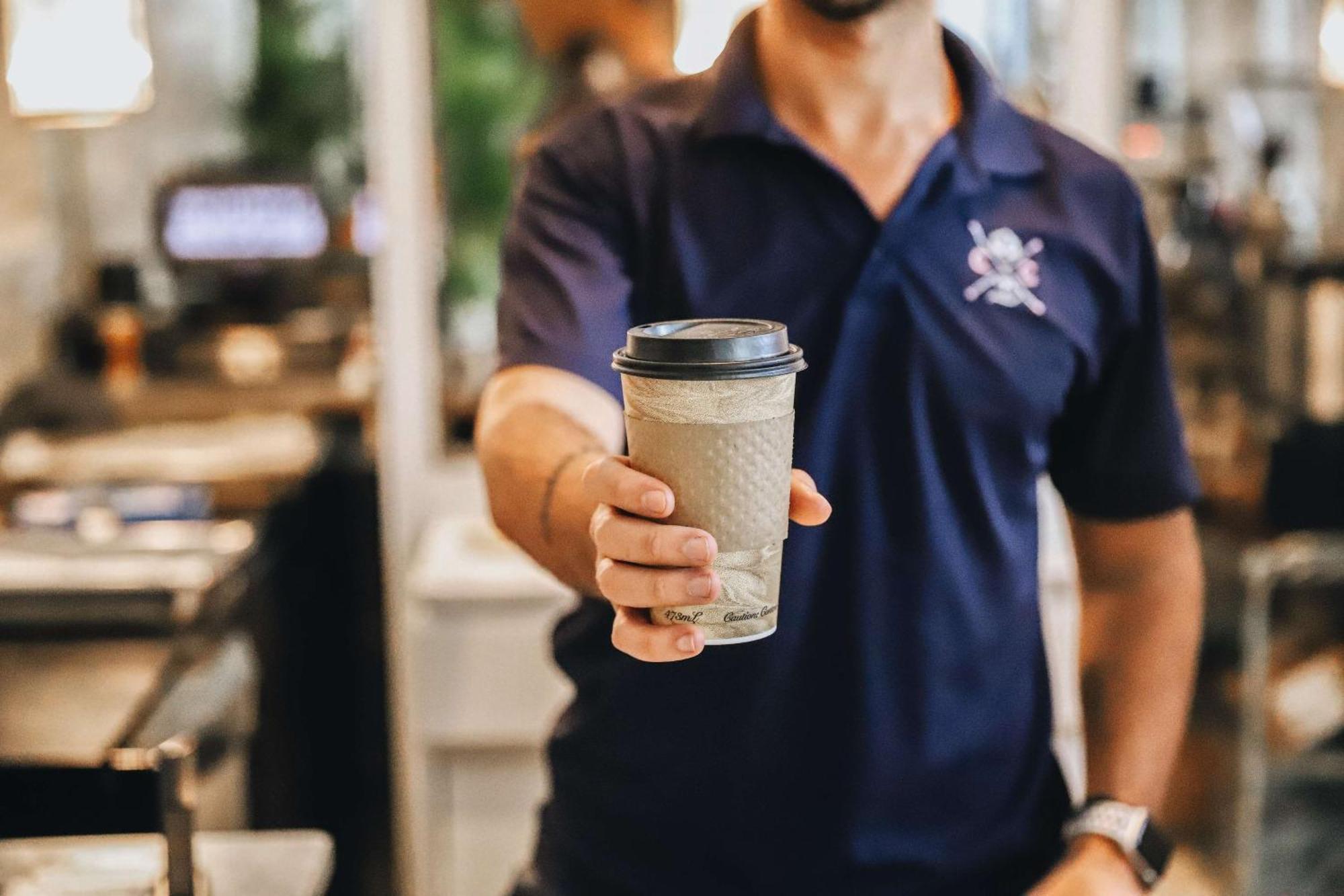 Nautilus Sonesta Miami Beach Bagian luar foto A barista serving a coffee